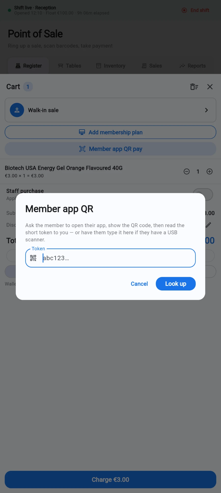 The Member app QR dialog opened from the cart on a device with no camera: it asks for the short token under the member's QR code, with a Token field, Cancel and Look up