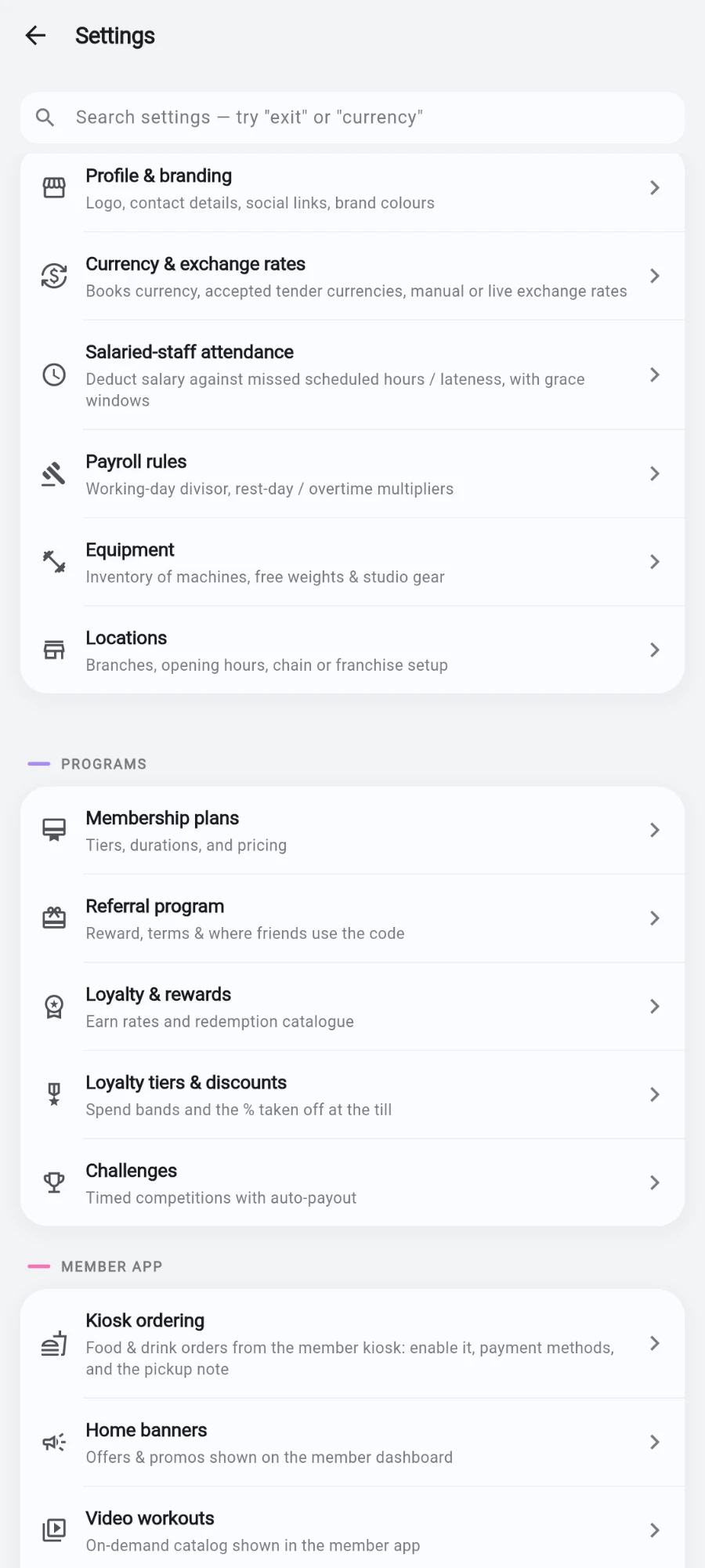 The GYM group rows with their subtitles — Profile & branding, Currency & exchange rates, Salaried-staff attendance, Payroll rules, Equipment and Locations — above the PROGRAMS group